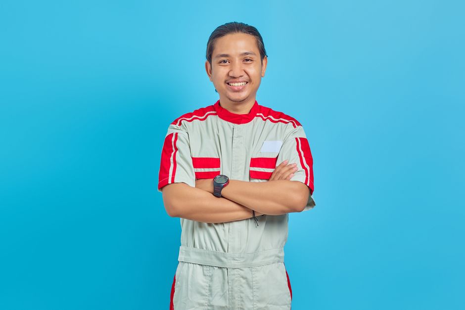 Smiling HVAC service technician ready to assist